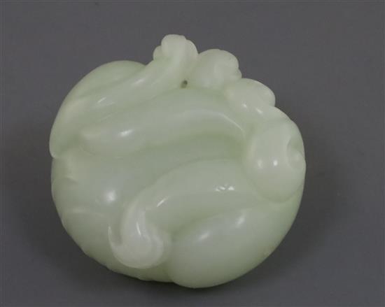 A Chinese celadon jade carving of a lion-dog, 5.3cm